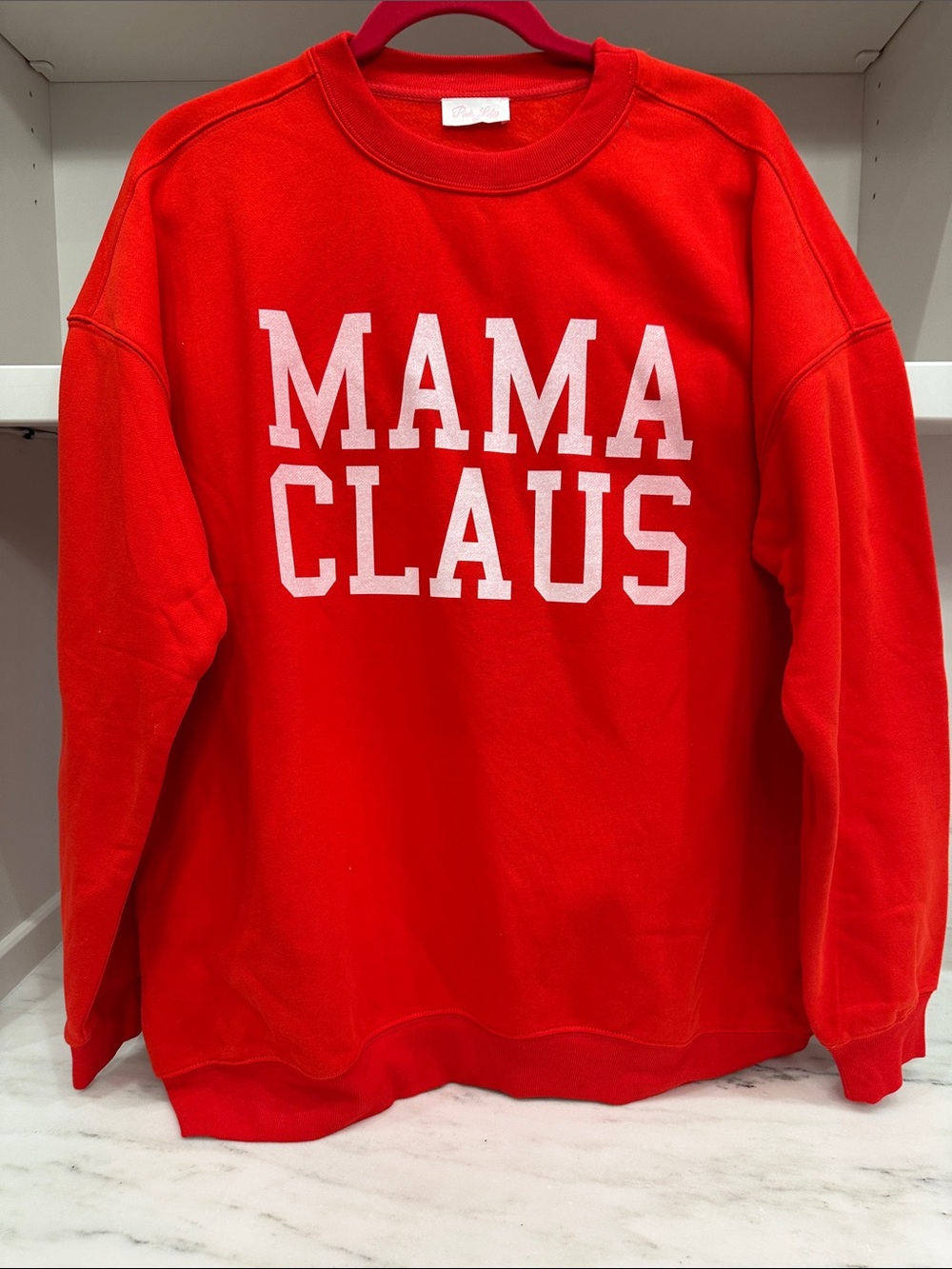 Pink Lily medium red sweatshirt with Mama logo. Like new
